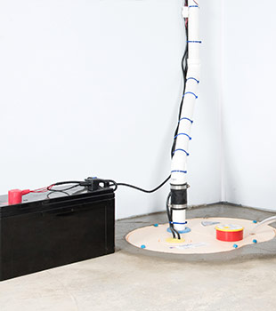 A sump pump installed in Pilot Butte  by North American Basement Systems