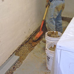 Digging a trench for a French Drain system in Regina