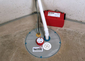 A sump pump system with a battery backup system installed in Carlyle