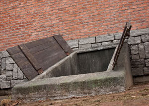 An open hatchway door in Rivers that's flooded.
