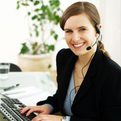 A disaster restoration customer service expert in Weyburn manning the phones