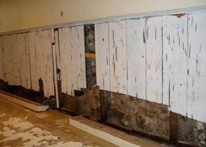 A wet, flooded finished basement in Grunthal