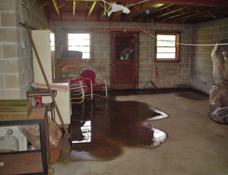 a flooded basement floor in a Melita home