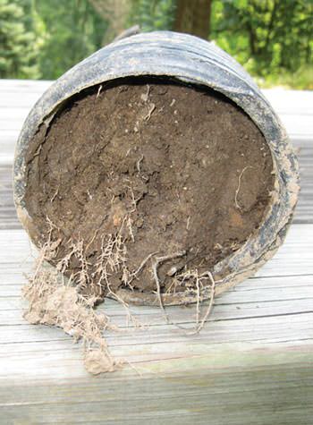 A generic photo of a weeping tile system for waterproofing wet basements.