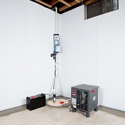 Sump pump system, dehumidifier, and basement wall panels installed during a sump pump installation in Souris 