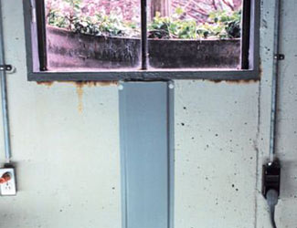 Repaired waterproofed basement window leak in Weyburn